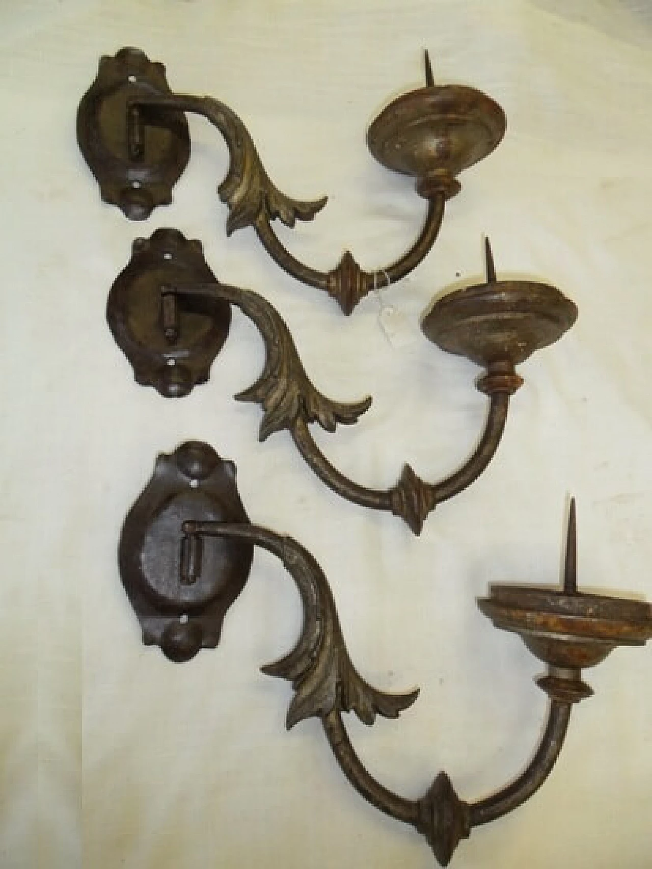 3 movable iron wall sconces, cast lead decoration 1088419