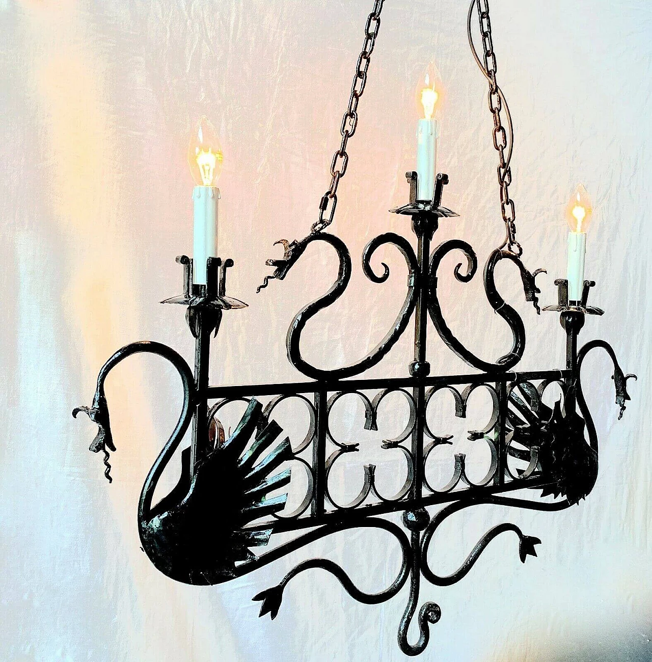 Pair of wrought iron chandeliers, 40s 1204632