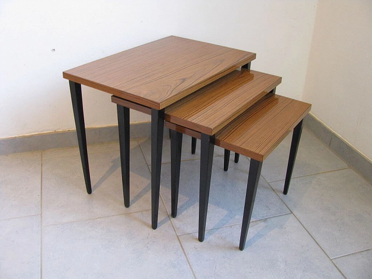 3 Nesting tables in wood, 50s 1217943