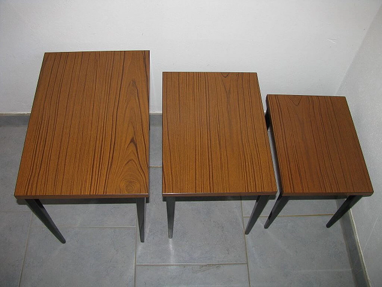 3 Nesting tables in wood, 50s 1217945