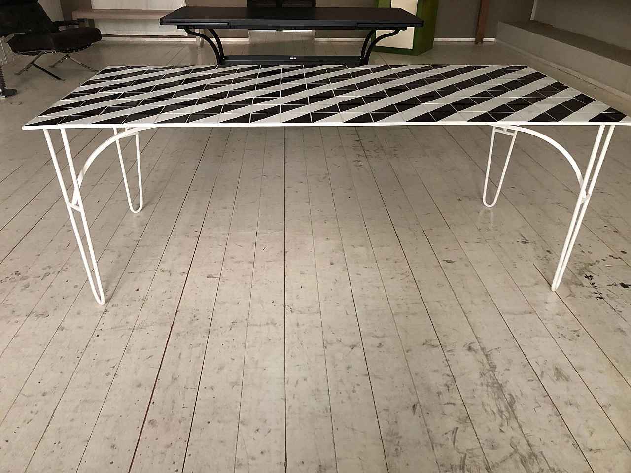 Iron table with black and white ceramic tile top 1282898