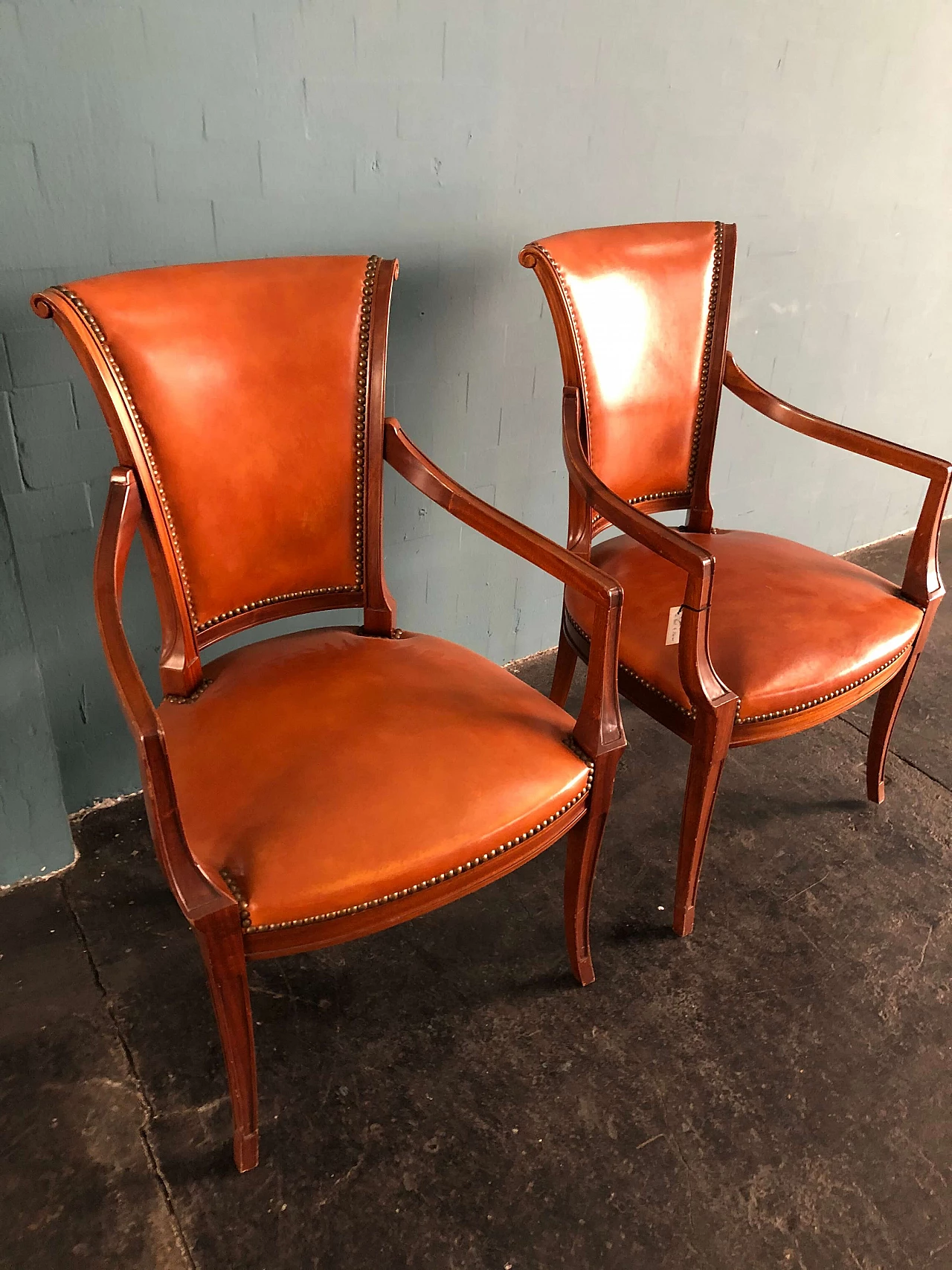 Pair of small neoclassical armchairs Empire style in walnut and leather 1290056