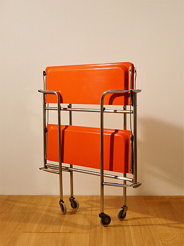 Orange plastic and metal folding trolley, 1970s