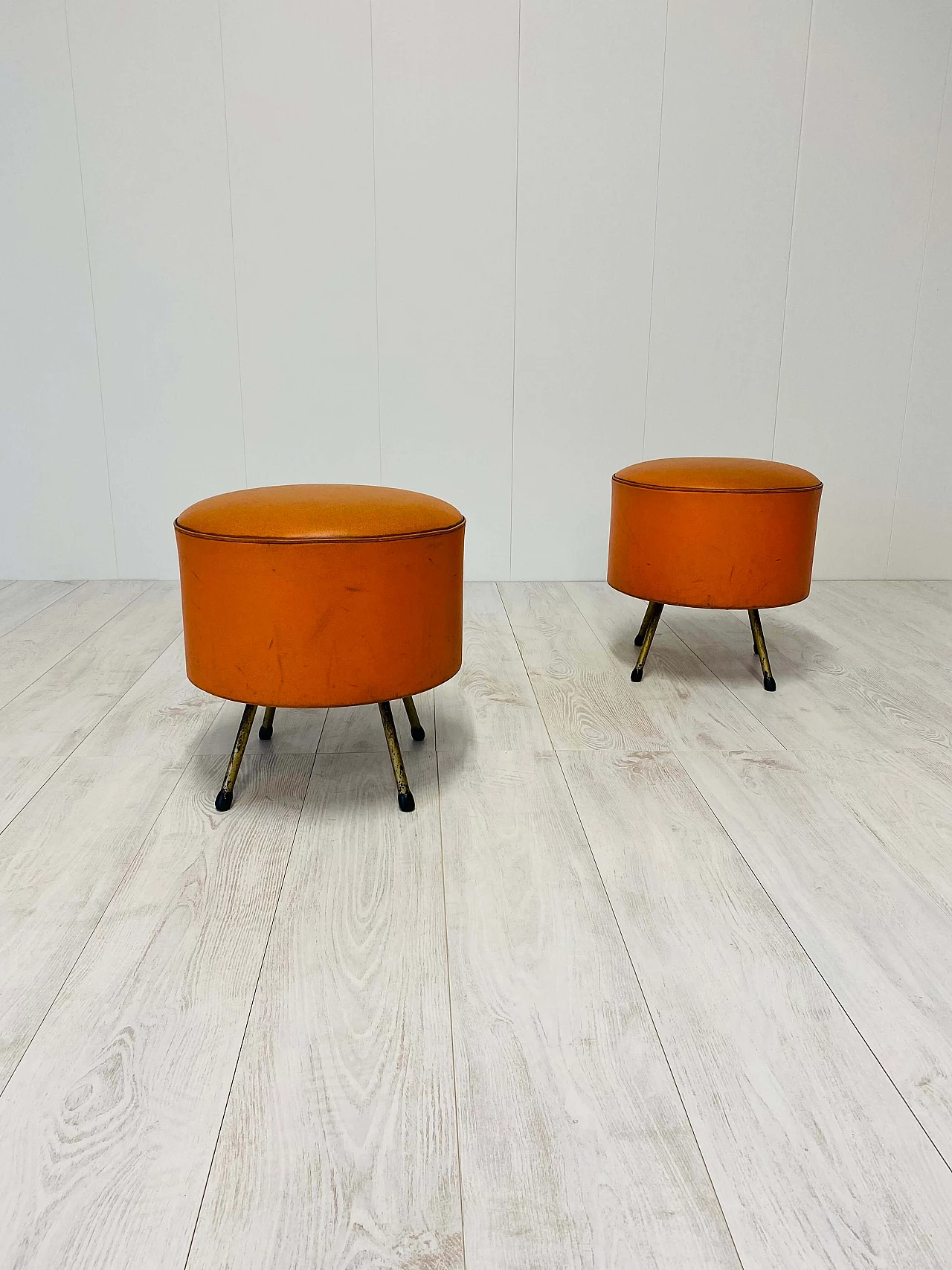 Pair of leather poufs, 70s 1383333