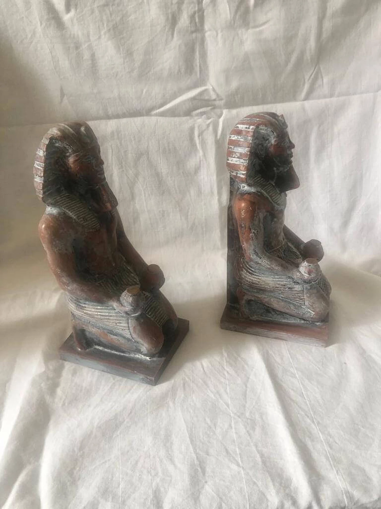 Pair of hand-carved Art Deco' sculptures of Egyptian Pharaohs in wood, 40s 9