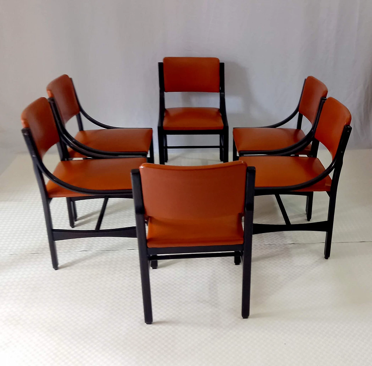 6 Orange and rosewood leather dining chairs, 1970s 1