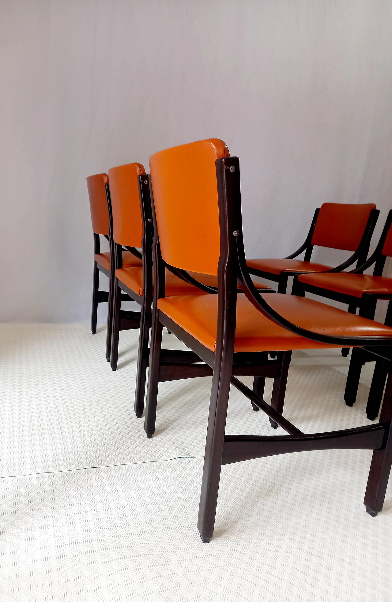 6 Orange and rosewood leather dining chairs, 1970s 5