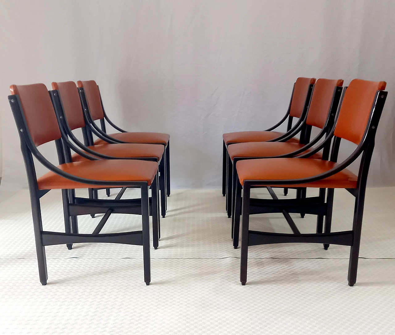 6 Orange and rosewood leather dining chairs, 1970s 6