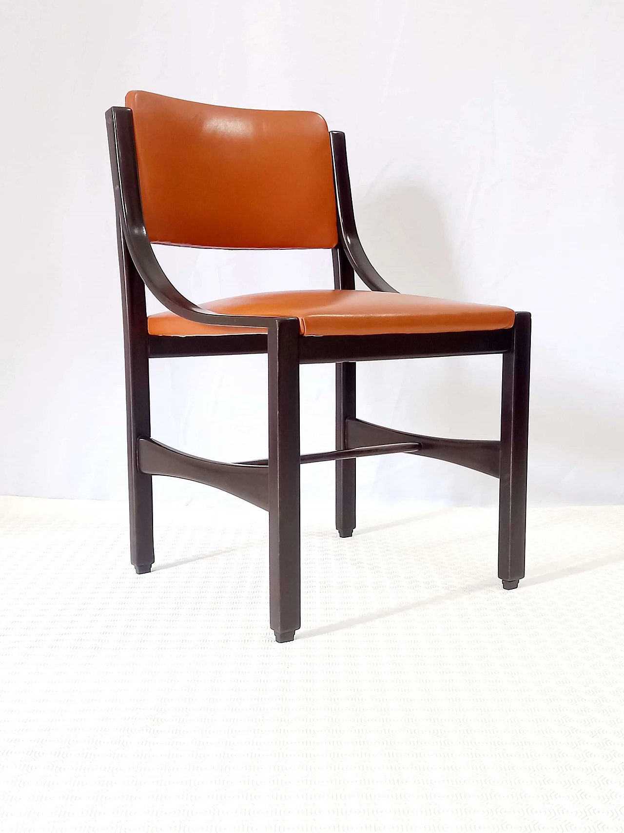 6 Orange and rosewood leather dining chairs, 1970s 23