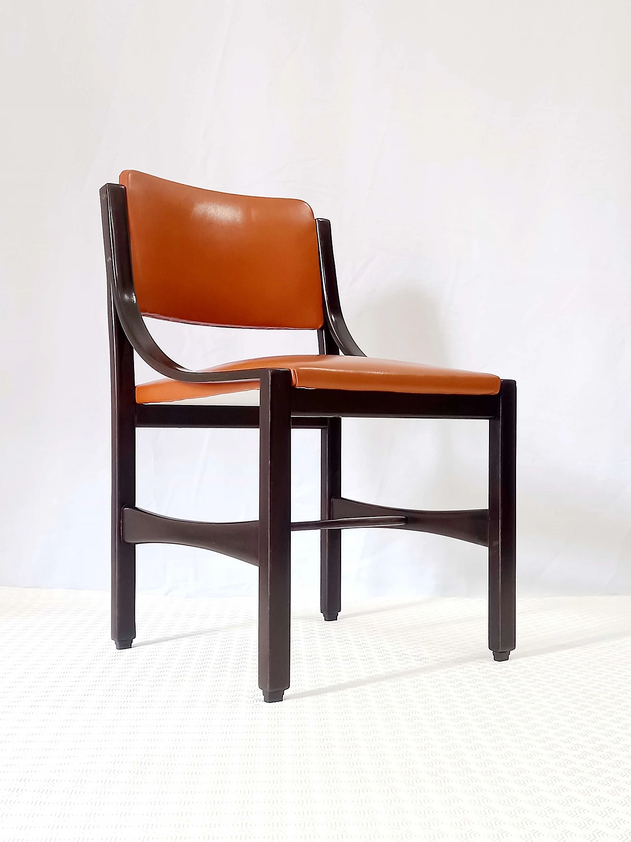 6 Orange and rosewood leather dining chairs, 1970s 24