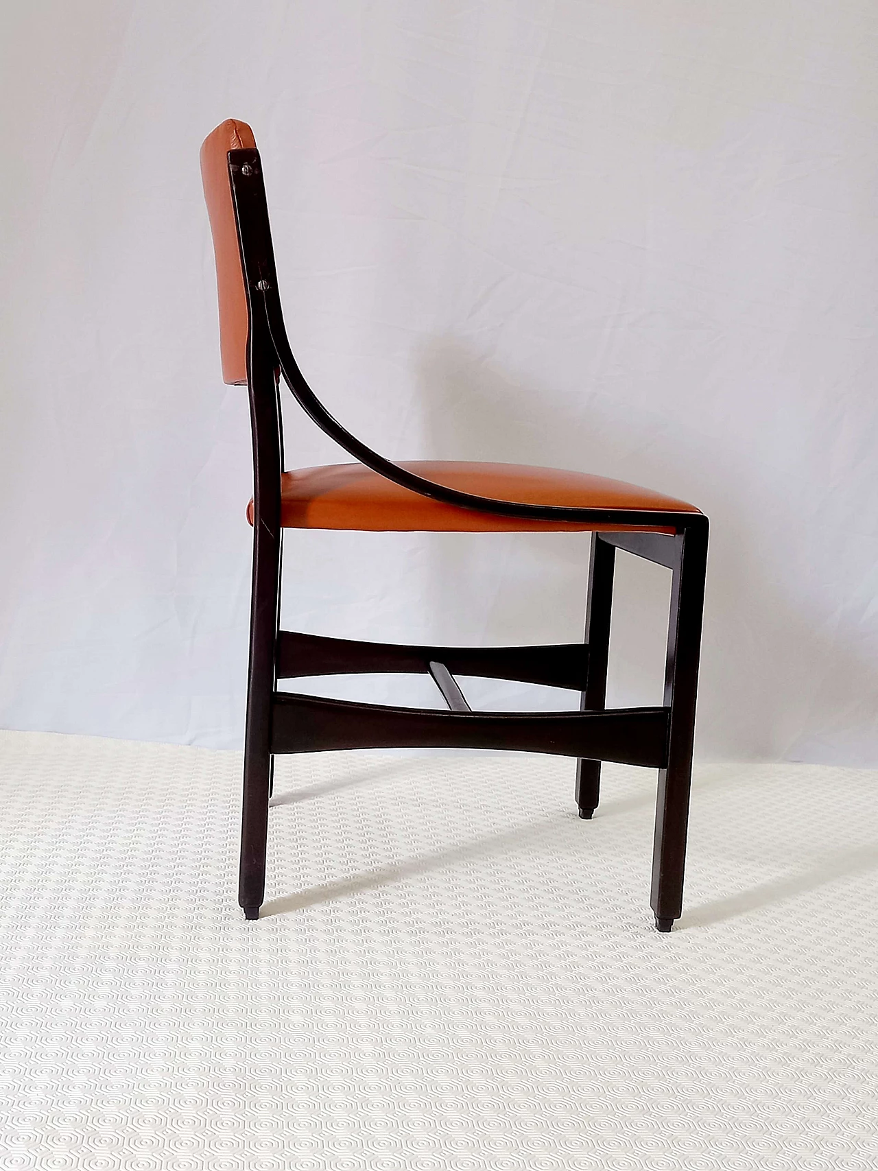 6 Orange and rosewood leather dining chairs, 1970s 25