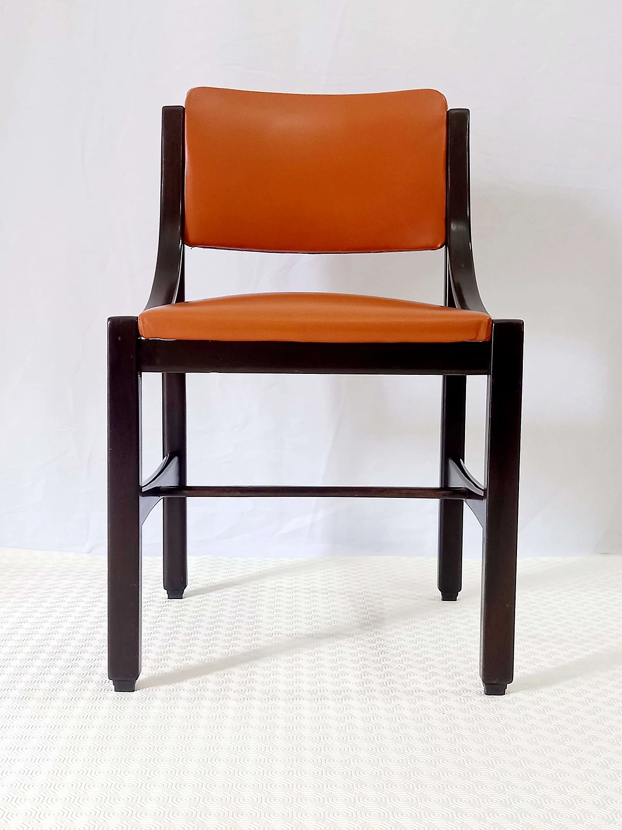 6 Orange and rosewood leather dining chairs, 1970s 28