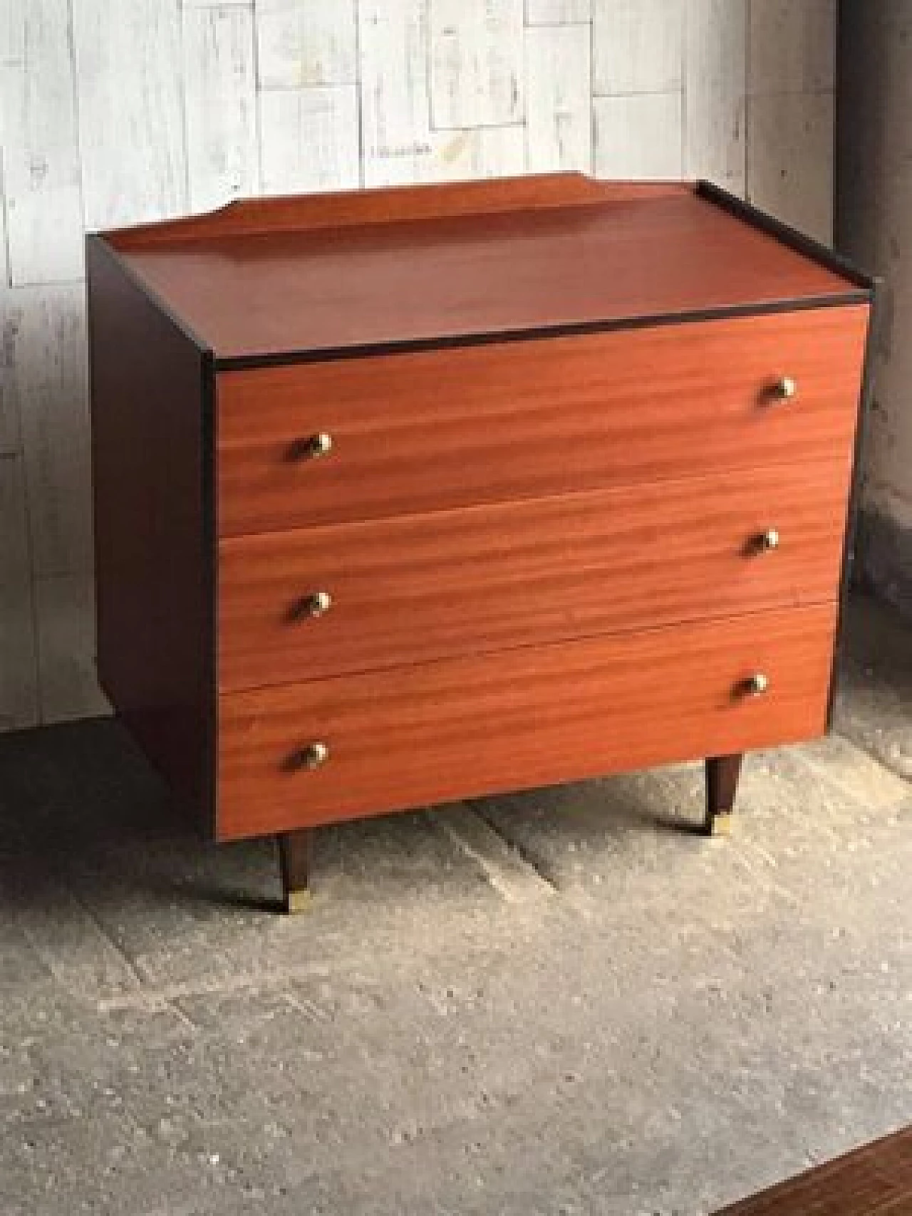 Chest of drawers in wood with black trim and gold knobs, 1960s 1