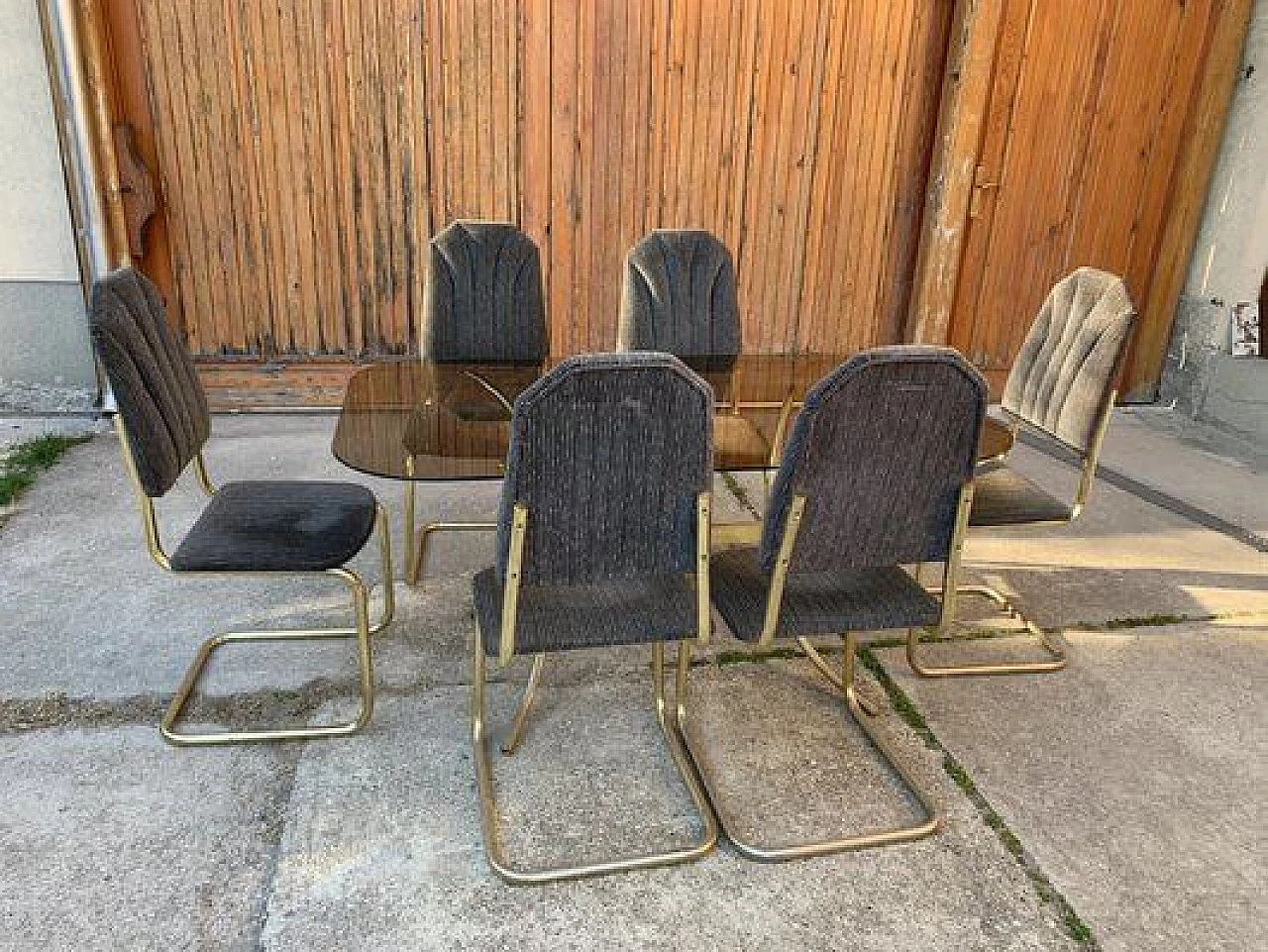 Dining table in glass with 6 chairs in brass, 1970s 4