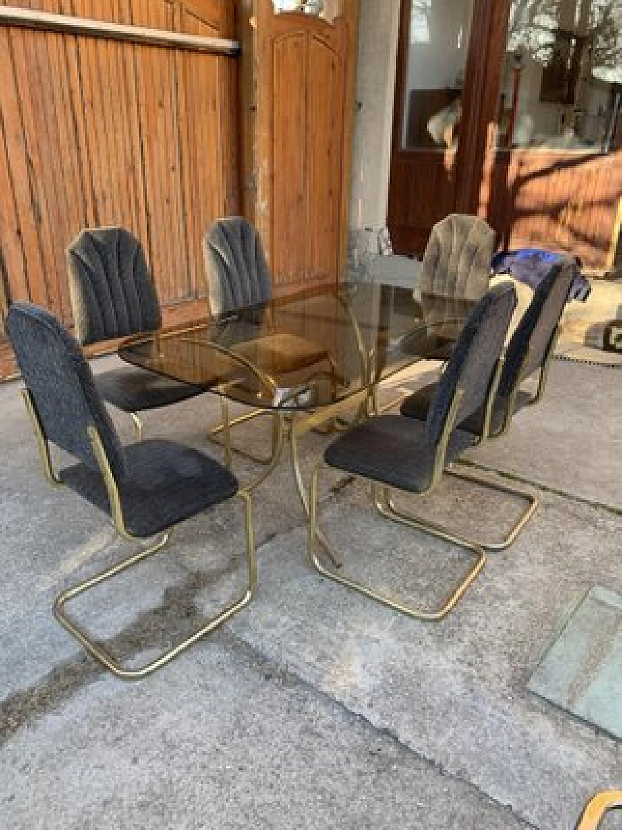 Dining table in glass with 6 chairs in brass, 1970s 5