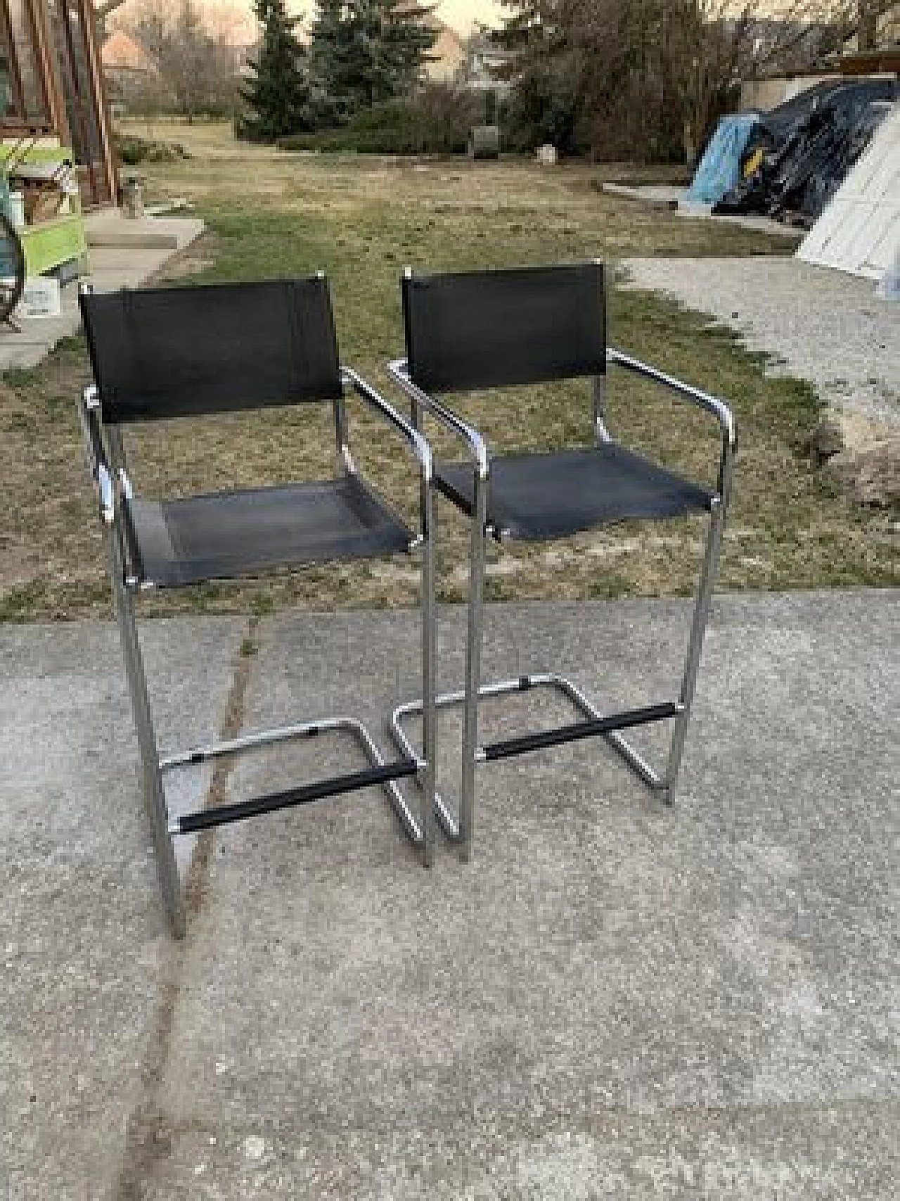 Pair of tubular chairs in black leatherette, 1970s 1