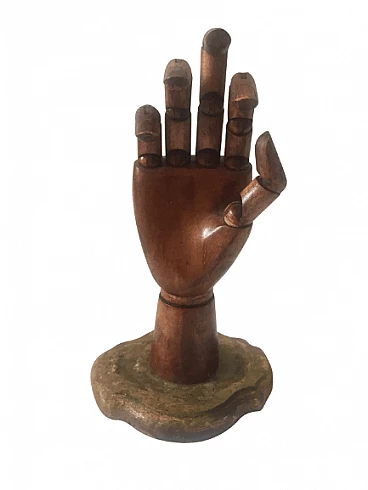 Wooden mannequin hand on a gilded base in natural size, 1920s