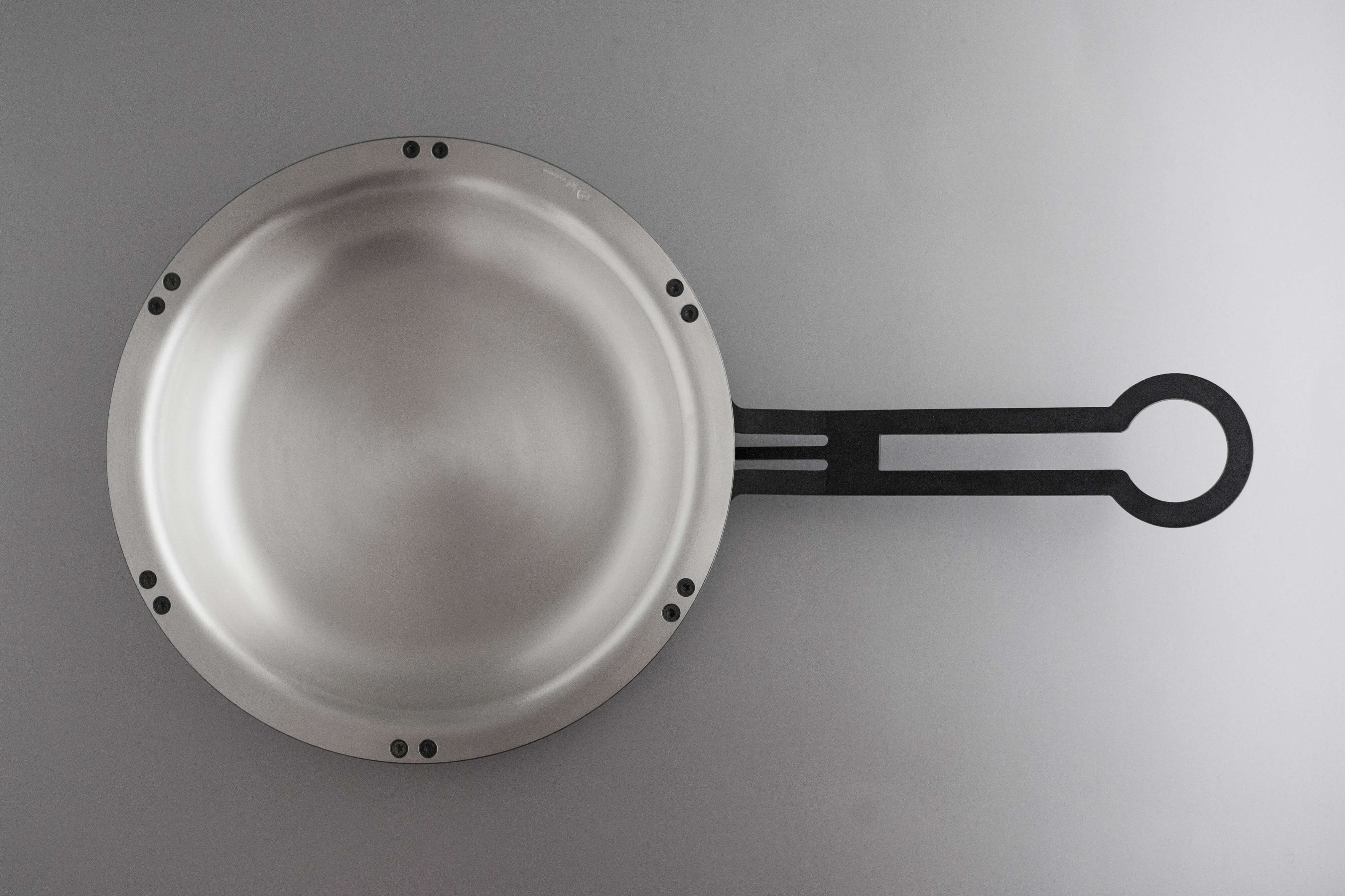 An amazing small saucepan made of iron with a pure silver coating. PAN999  Collection design by Tobia Scarpa – Gioel Milano