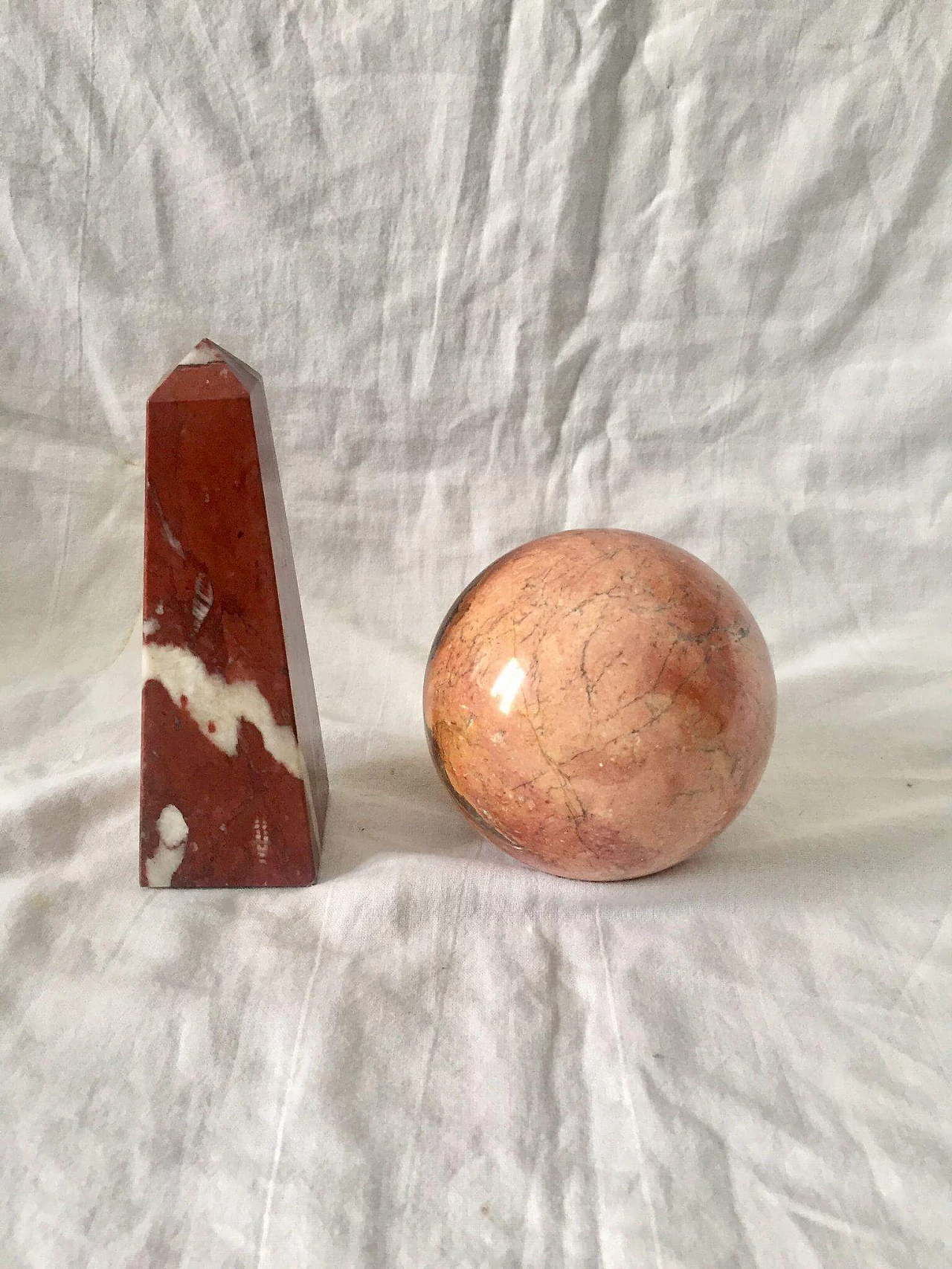 Pair of marble objects in the shape of a sphere and obelisk, 1940s 11