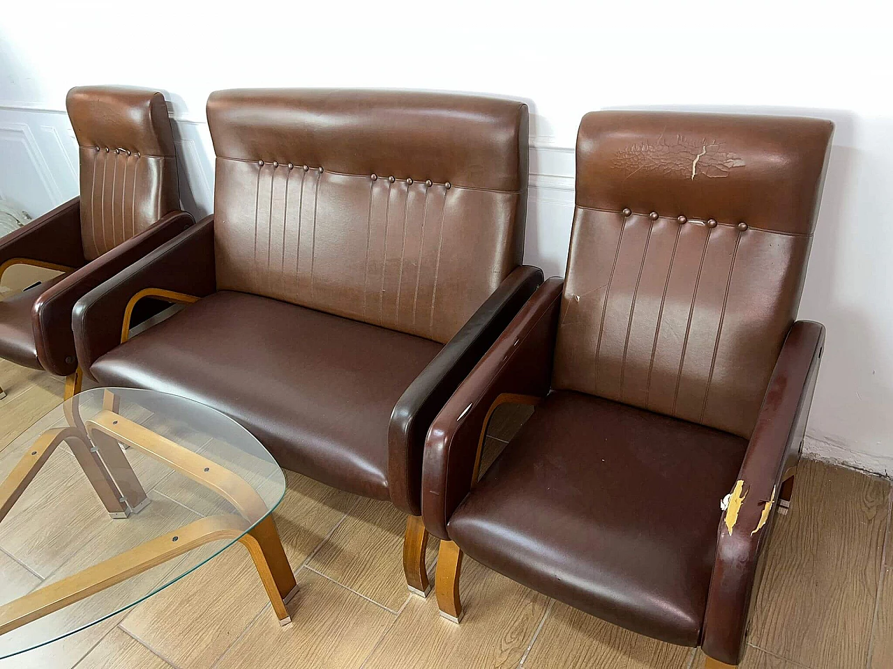 Sofa and pair of armchairs in leather and glass side table, 1960s 15