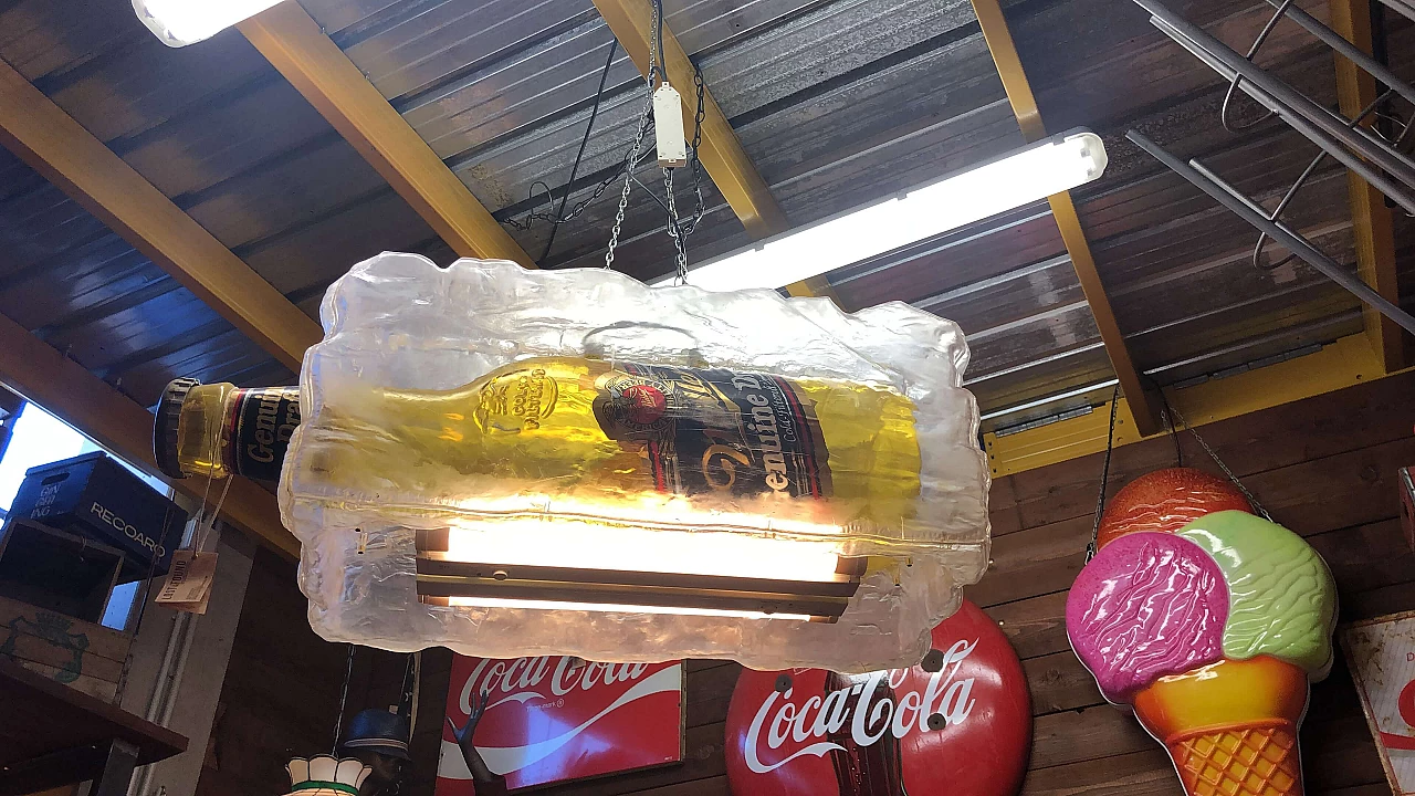 Chandelier in the shape of a beer bottle set in an ice cube, 1990s 3