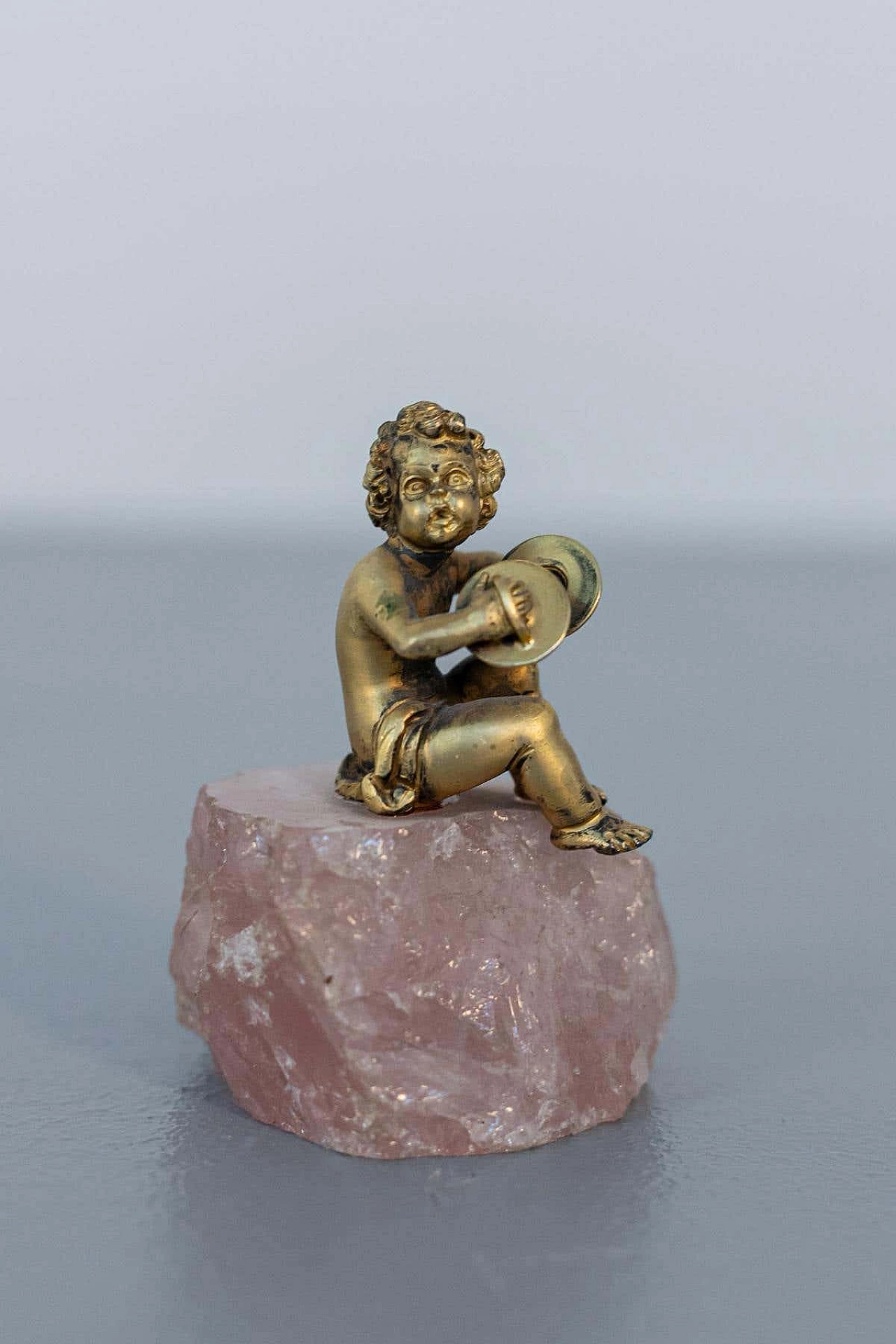 Gilded silver sculpture of a cherub on a rose quartz base, late 18th century 2