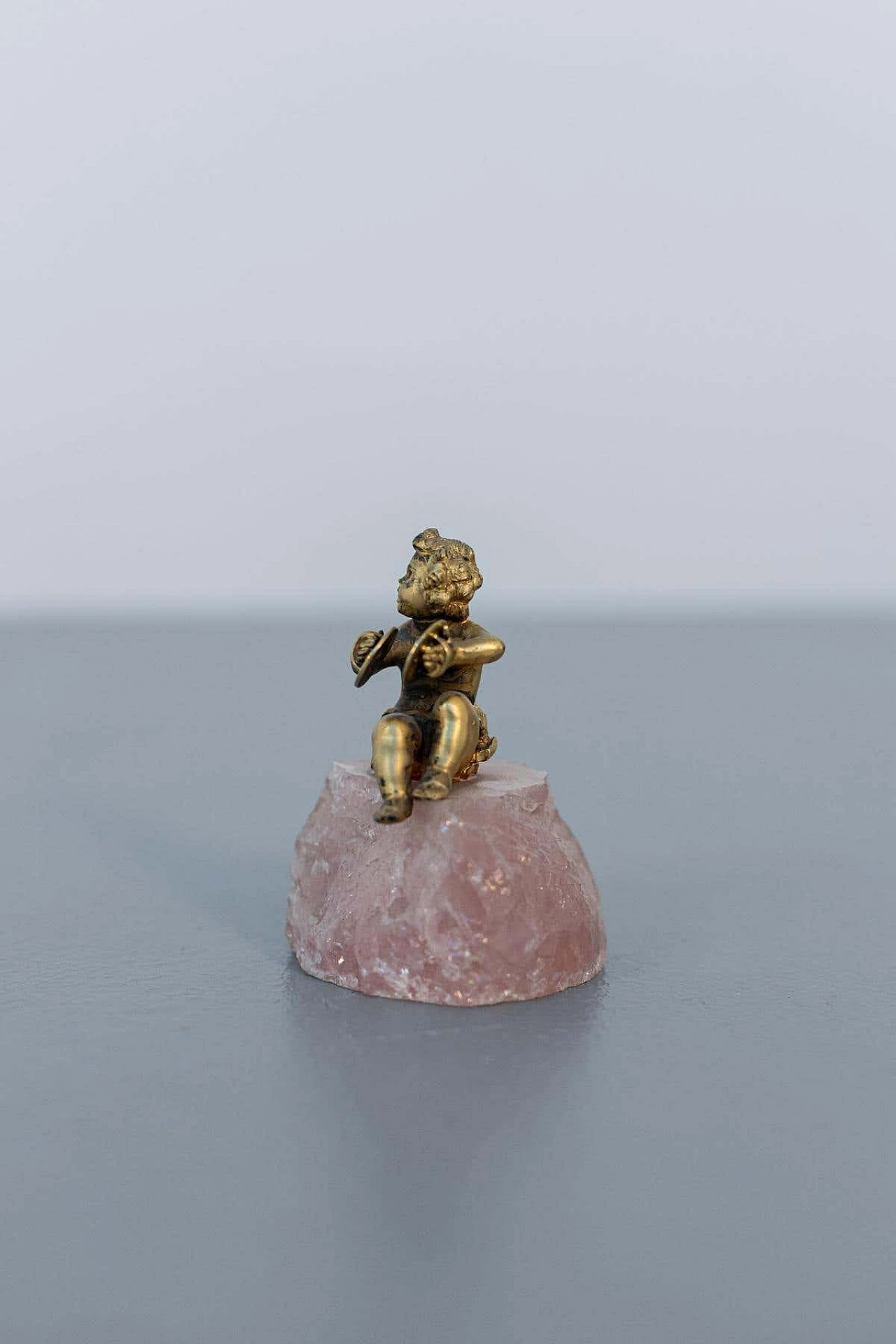 Gilded silver sculpture of a cherub on a rose quartz base, late 18th century 4