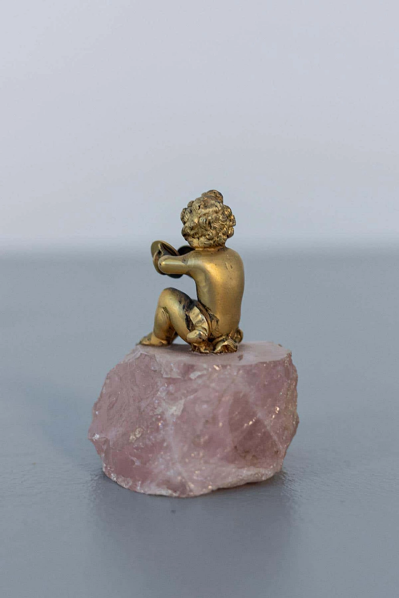 Gilded silver sculpture of a cherub on a rose quartz base, late 18th century 5