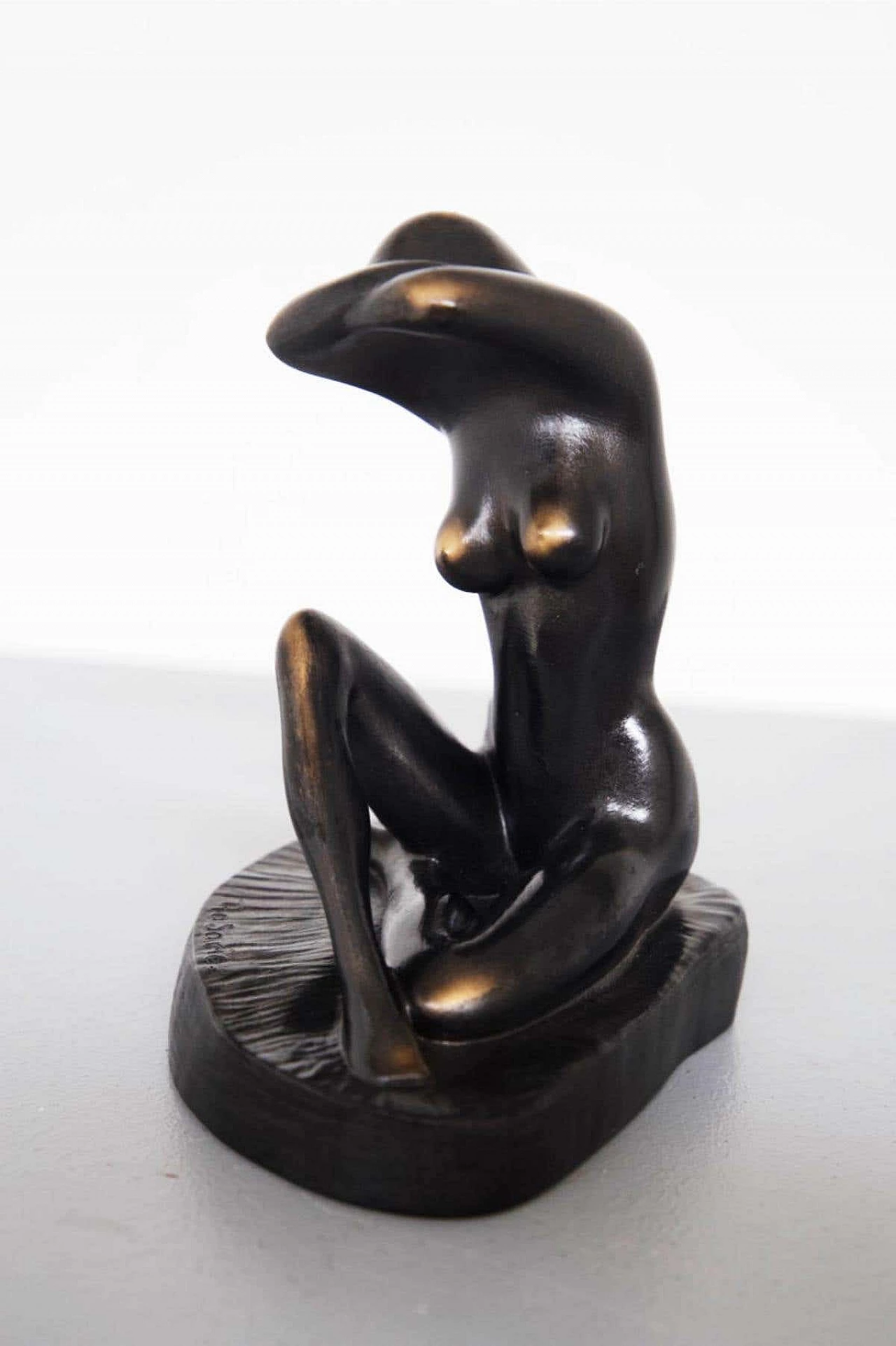 Metal and wood statue of a nude woman, 1970s 5