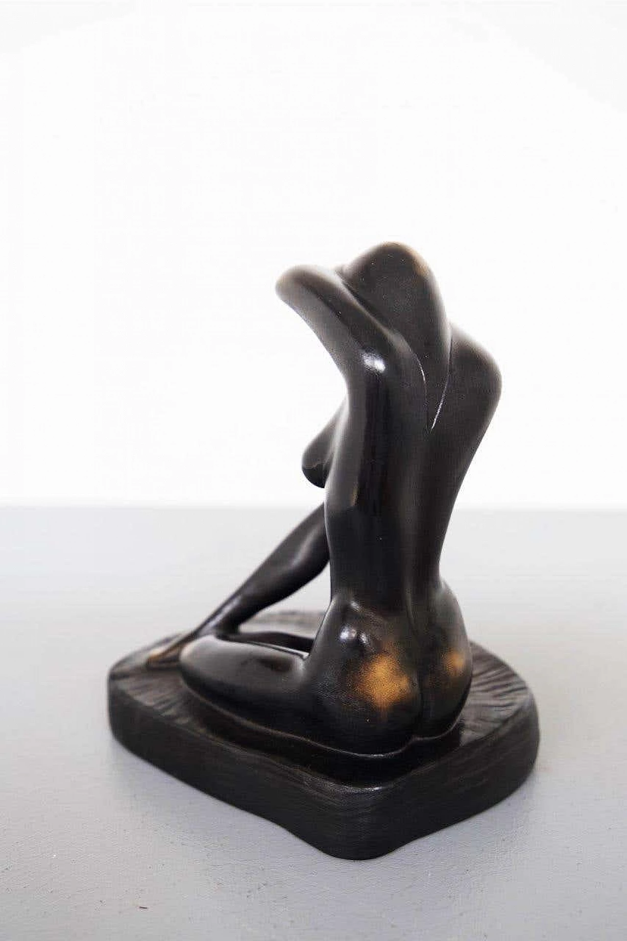 Metal and wood statue of a nude woman, 1970s 7