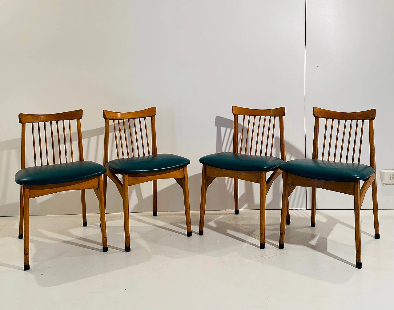 4 Solid beech and skai chairs, 1960s 1