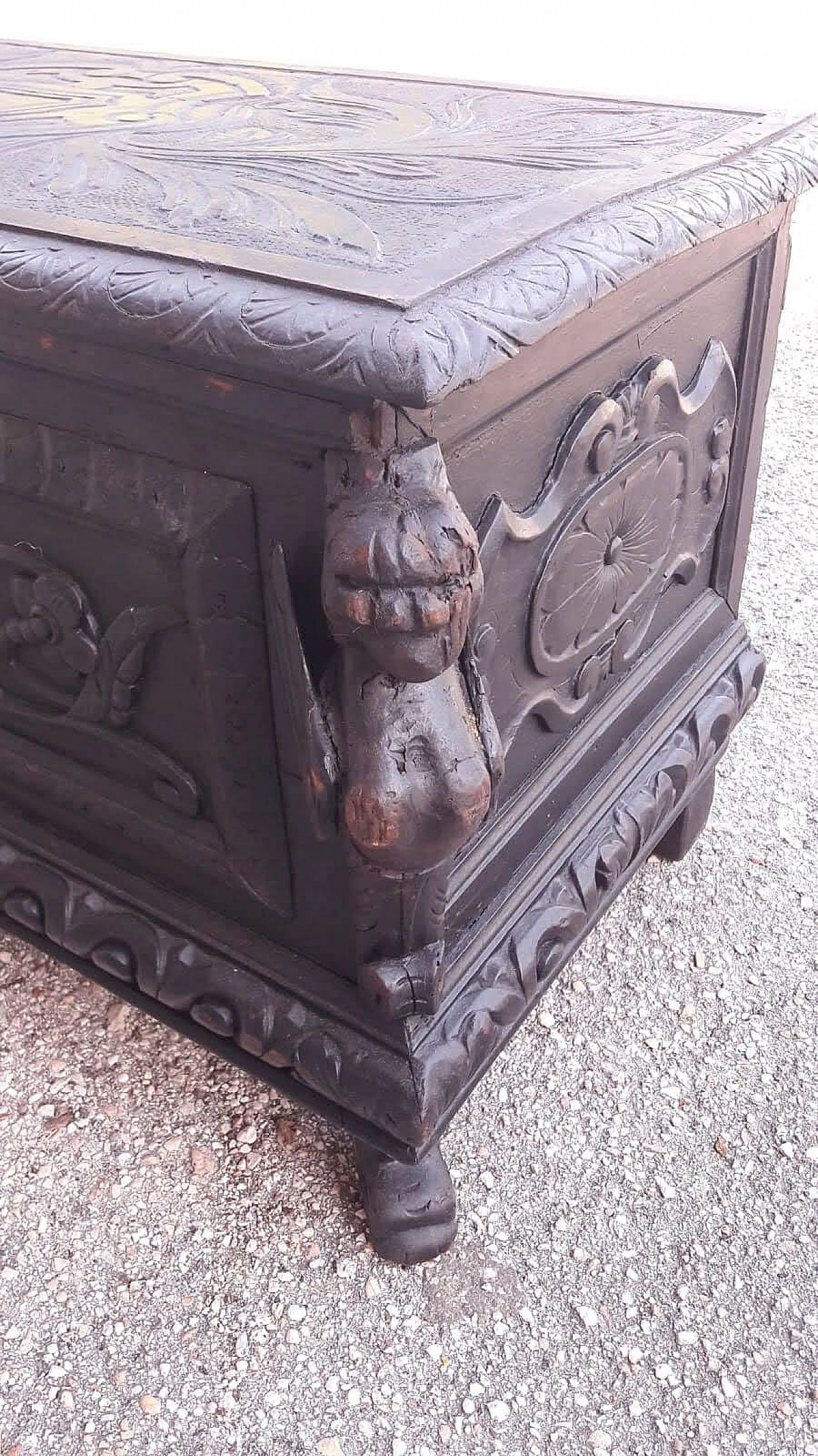 Wooden case carved with emblem and winged animals, late 19th century 1