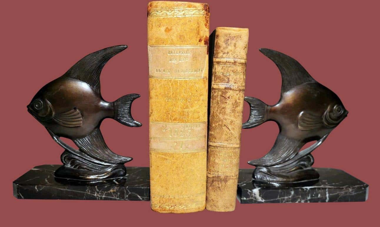Pair of fish-shaped choice bookends with Marquinia marble base