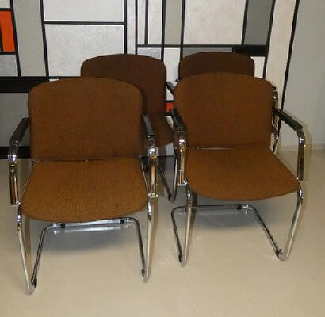 4 Wool and steel chairs with armrests, 1970s 24