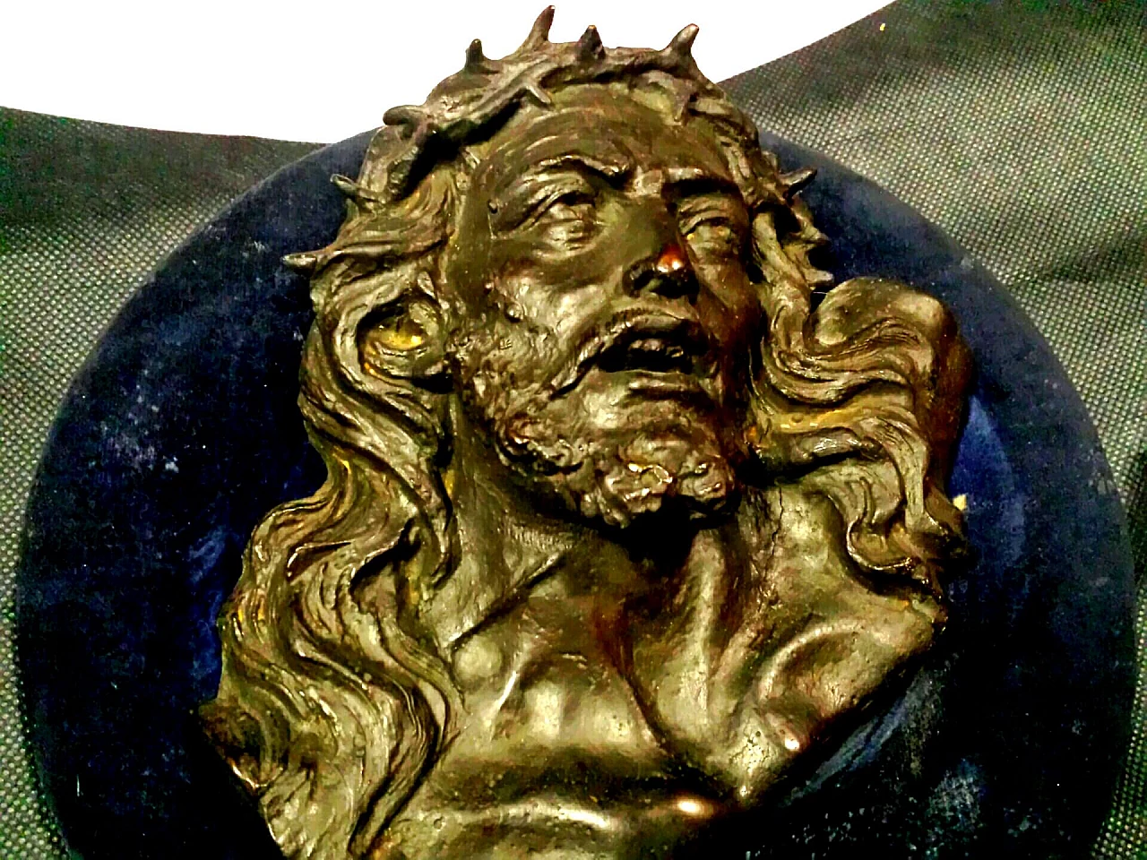 Face of Christ, bronze bas-relief on wood panel, early 20th century 1