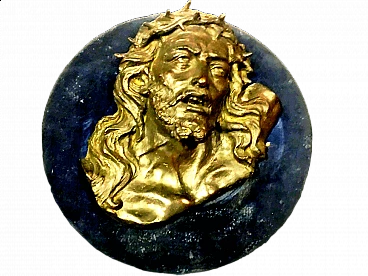 Face of Christ, bronze bas-relief on wood panel, early 20th century