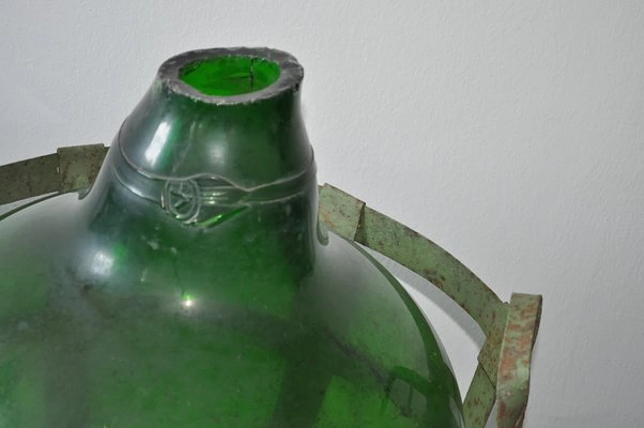 Blown green glass bottle with metal basket 3