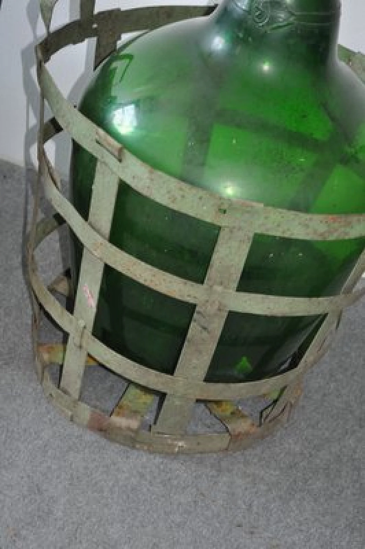 Blown green glass bottle with metal basket 6