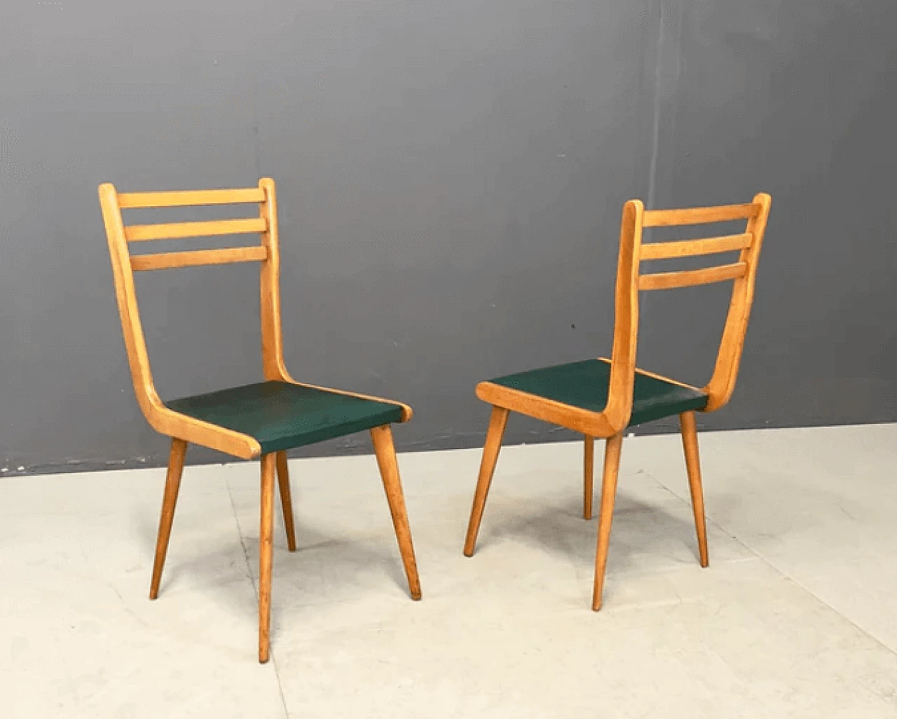 Pair of beech and leatherette chairs by Reguitti, 1950s 1