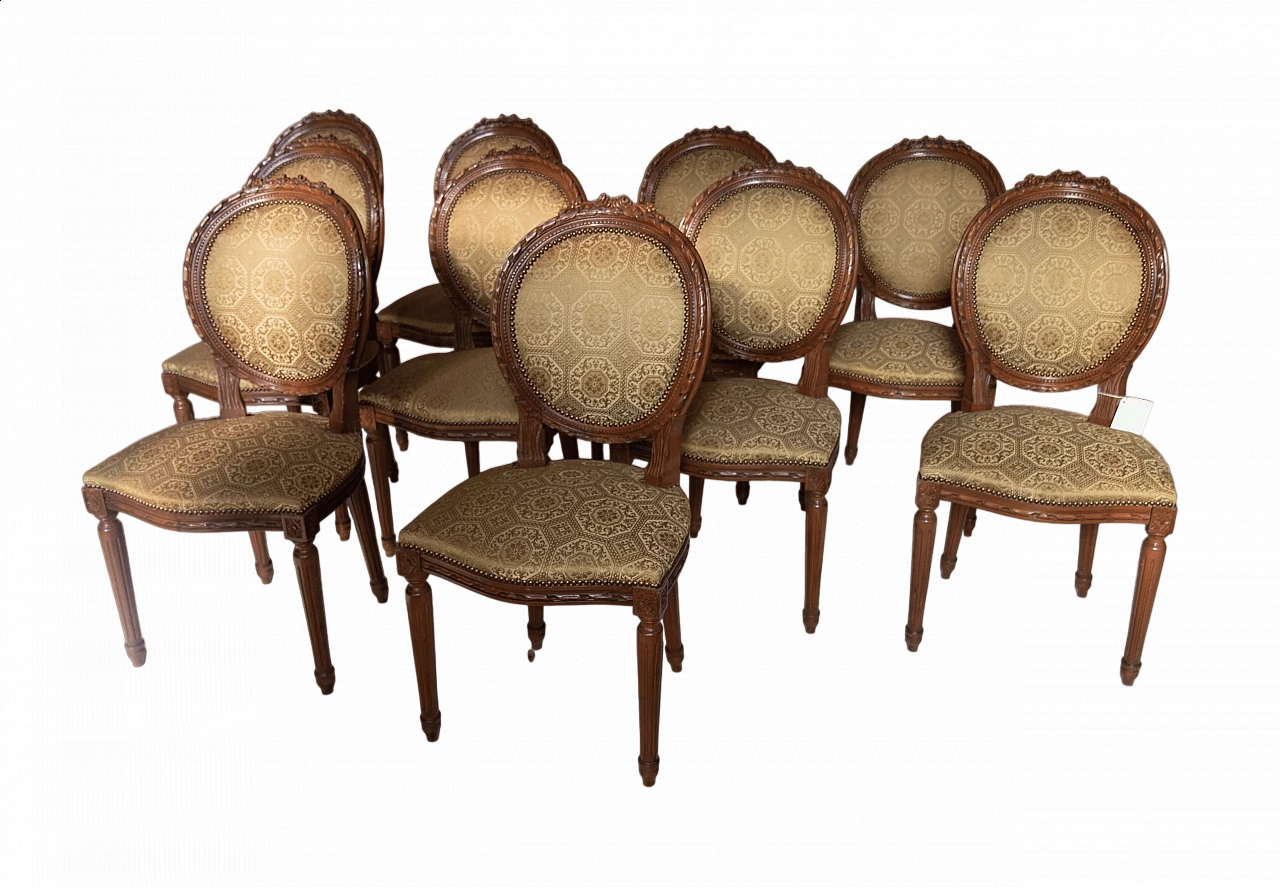 10 Solid walnut chairs in Louis XVI style with turned legs, early 20th century 11