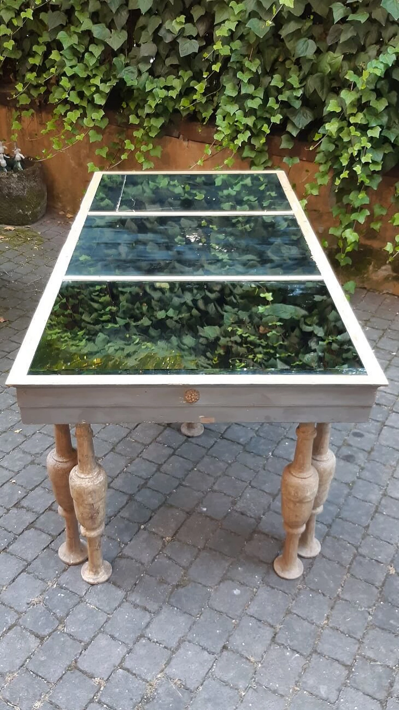 Table with 19th-century mirrored top and 18th-century spool legs, early 20th century 2