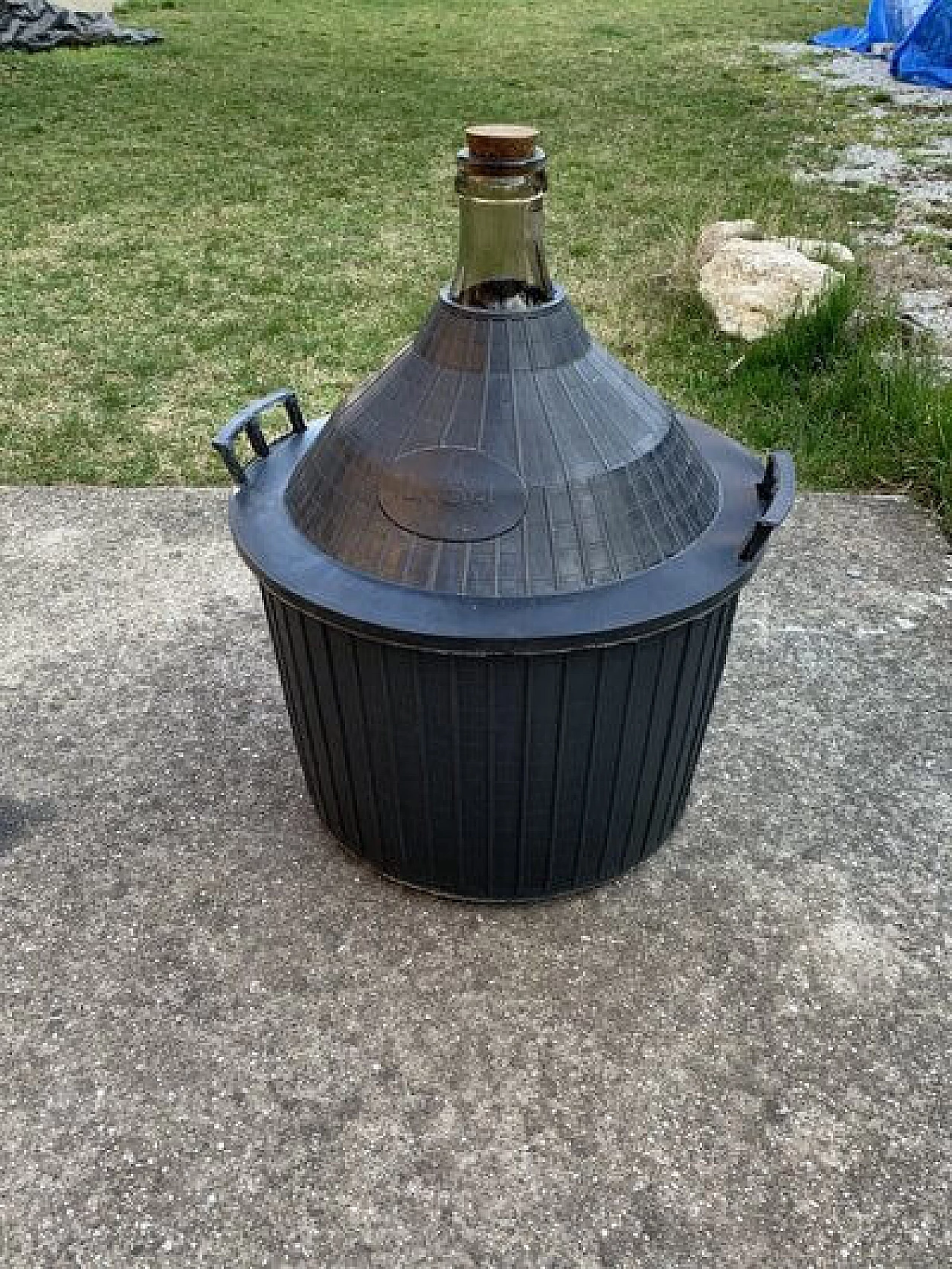 Glass demijohn with plastic basket, 1950s 5