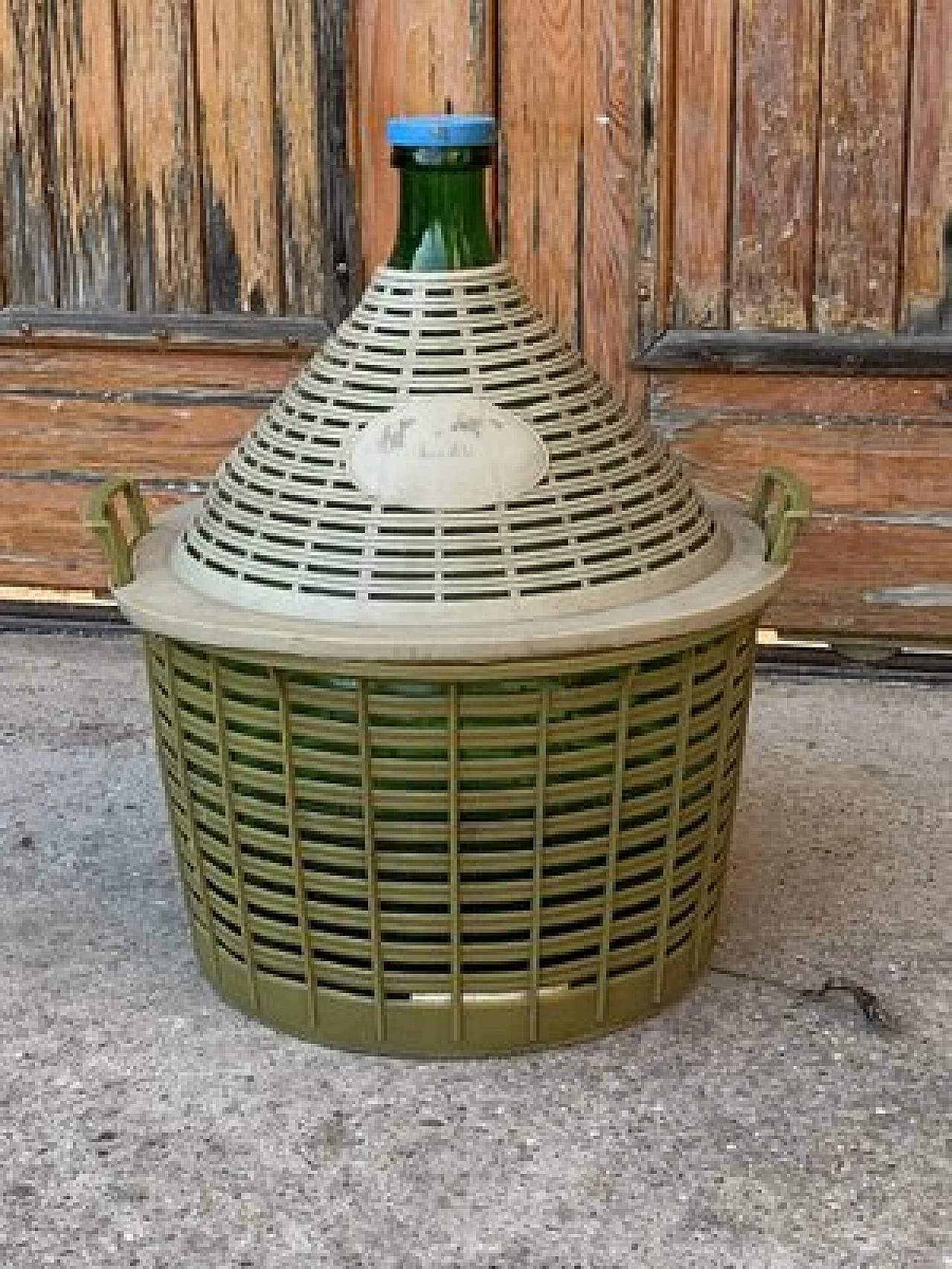 Hungarian green glass demijohn with plastic basket, 1950s 4