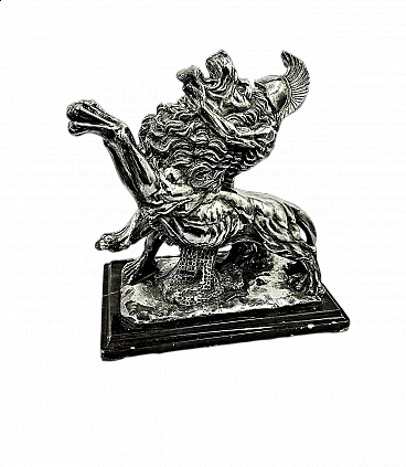 Silver sculpture depicting Roman gladiator against lion, 1970s