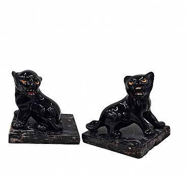 Pair of ceramic and marble bookends with panther cubs, 1930s