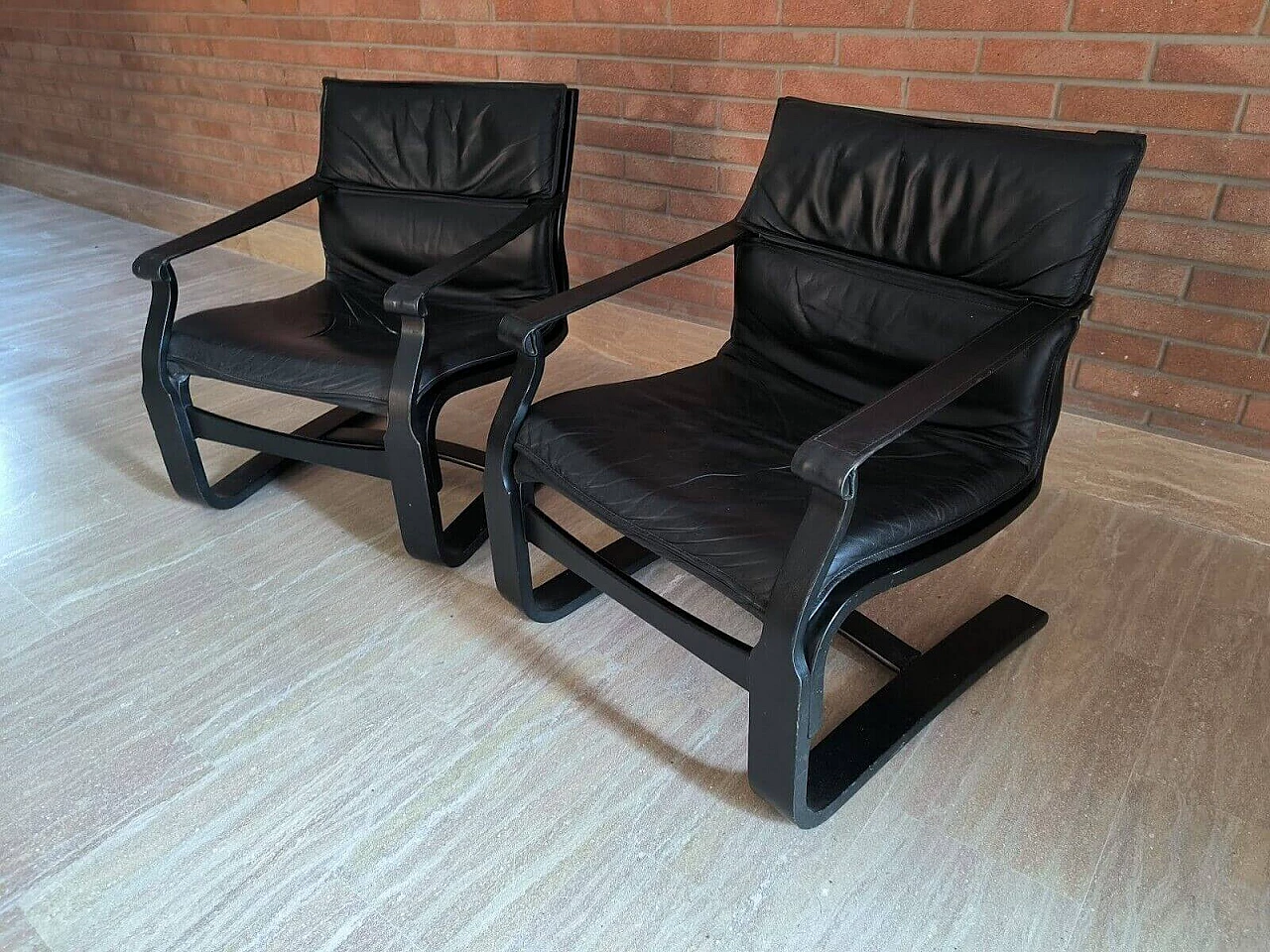 Pair of wood and black leather armchairs by Ake Fribytten for Nelo, 1970s 1