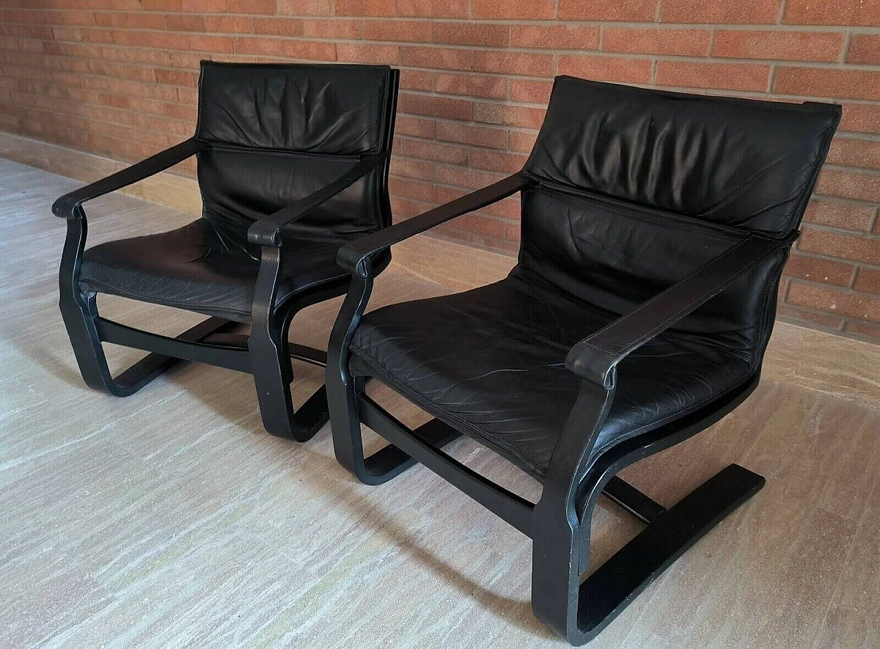 Pair of wood and black leather armchairs by Ake Fribytten for Nelo, 1970s 3