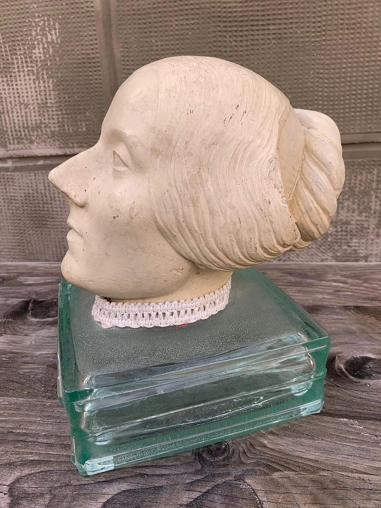 Plaster head of a woman on glass base, early 20th century 2