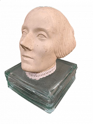 Plaster head of a woman on glass base, early 20th century