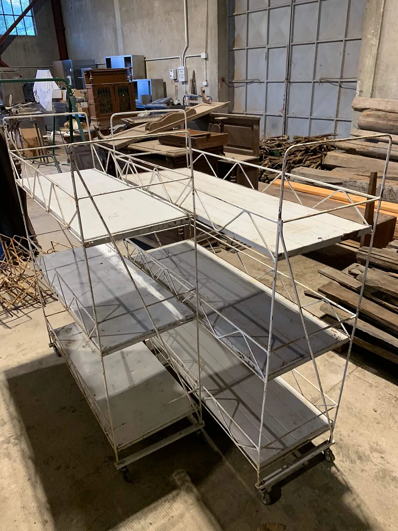 Pair of white metal carts with marble shelves, 1930s 9